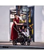 1150099110_F6_2026_maxicosi_stroller_oxford_oaktruffle_oxford_lifestyle_mompushingstrollerthroughcity