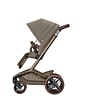 MCBS1122152384428065300_F1_2026_maxicosi_famepebbletravelsystem_oaktruffle_strollerside