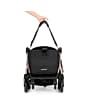 1102672630_2025_maxicosi_stroller_Eva3_essentialblackchampagne_carryingstrap_front